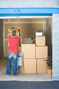 moving boxes into a storage unit
