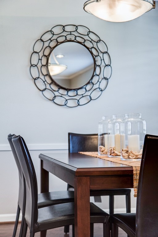 dining room with large mirror